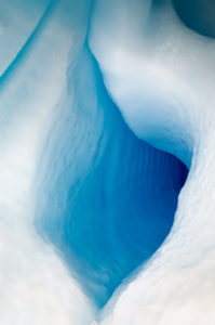 Paradise Harbor, also known as Paradise Bay, is a wide embayment behind Lemaire and Bryde Islands in Antarctica. This photo is a close-up abstract image of one of the icebergs.