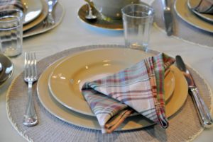 Laura decorated it with drabware dishes and cheerful plaid napkins - the perfect touch for this special meal.