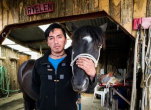 One of the Chilean stable hands stopped to pose for this photo with one of the prized horses. Everyone was so friendly.