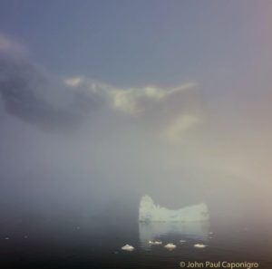 Here, John Paul showed the soft mood of icebergs drifting in dense fog in Black Head, 2017.