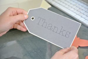 Here is the gift tag with the word "thanks" perfectly centered on the card stock.