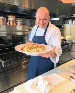 Here is Chef Pierre with one of the platters ready to be placed on the counter.