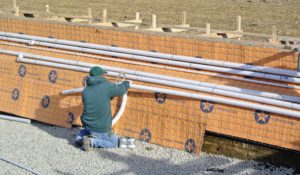 And PVC pipe is installed and extended to the mechanical equipment location on the other side of the paddock. These pipes accommodate the main drain and all the other mechanical lines for the pool.