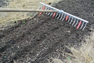 It’s a cleverly designed tool for making multiple straight rows in one pass. The depth of the furrows depends on the amount of pressure placed on the rake as it moves through the soil.