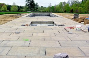 The pool is now coming to life - the stone pavers around the pool and patio area are installed. The stone is from Luppino Landscaping and Masonry. http://luppinolm.com/