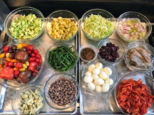 Pierre always prepares the mis en place first. Mise en place is a French culinary phrase meaning “putting in place.” It refers to the set up and arranging of the ingredients for the meal.