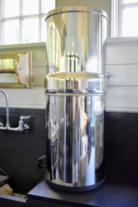 This Berkey is in my Flower Room, just outside my Winter House kitchen. The Berkey Systems can easily purify ordinary tap water, but they are powerful enough to efficiently purify raw, untreated water from sources such as remote lakes and streams, which is helpful during natural disasters when treated water may not be available.