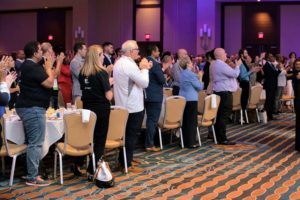 It was an honor to see audience members stand as I was introduced on stage. The Champion of Enterprise Award is among the highest honors presented by the NGLCC. (Photo by Rachel Stevenson/OUTCOAST Photography)