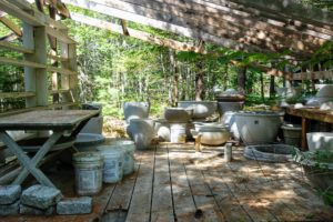 The large open porches, overlooking the woods, are filled with fine examples of the potters' work.