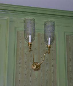 The use of other materials to make sconces continued during the 18th century. This antique sconce is one of a pair in my Green Parlor. The brass sparkles so beautifully since their recent cleaning.