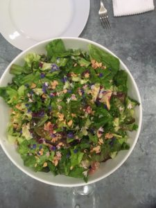 And here is a simple, light, and fresh salad of mixed lettuces from the garden, chopped Marcona almonds, chives, parsley, and flowers from Triple Chick Farm.