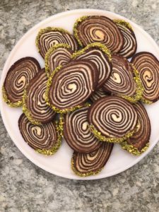 And don't you want to make these woodland faux bois cookies iced with green pistachios on the edge? The cookie is a vanilla and chocolate shortbread swirl - totally irresistible.