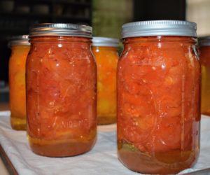 Sealed jars can be stored in a cool, dark place for up to a year. And be sure to label them with canning dates. All these tomatoes will make delicious sauces for me and my family.