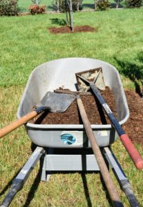For this phase of the project, the crew uses a shovel, a hard rake and a tamper.