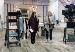 I began the long QVC day with host, Sandra Bennett. We are both wearing my Ruana. It comes in five different colors - all perfect for the chilly days of fall.