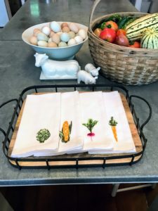 These are my Farmhouse Veggie Napkins. They are perfect for any country-inspired table setting. They're made of 100-percent cotton and are machine washable.