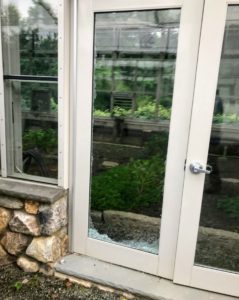 This is the other glass door that was broken. Again, only one of two double panes. It is a little hard to see here, but the remaining pane is in this door.
