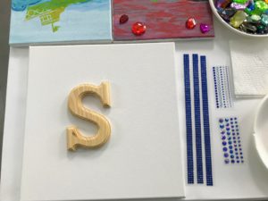 Each of the girls started working on a collage using our Michaels family-friendly paints. Children love to craft and this is the perfect project to do during the party.
