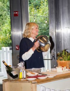 Here I am hosting my "Good Things" demo - I'm sharing my way of peeling garlic using two stainless steel bowls. Everyone loved this "good thing". Other "good things" included my tips for slicing cherry tomatoes, cooking corn on the cob in the microwave, sugaring bitters molds, and making perfectly glittered champagne glass rims. (Photo by Richard Formicola)