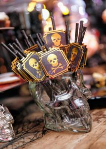 And all your Halloween guests can sip drinks with these matching skull straws. These themed straws look great in cocktail glasses or in mason jars and come with coordinating beverage napkins. (Photo by Brian Ach/Getty Images for Michaels)