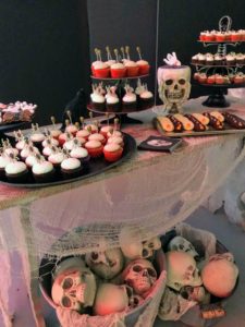 We also served lots of delicious Halloween bites including cookies, cupcakes and tombstone shaped mini cakes - all on a table decorated with various trays and table accessories from my collection at Michaels.
