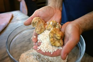 Here is Pierre holding the white truffles with the risotto. Known as the white Alba truffle, Tuber magnatum pico is famous for its distinct aroma and intense, earthy flavor.
