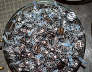 We have lots of delicious chocolate favorites for the children, including these Hershey's Kisses. These are "Hugs" - white chocolate with strips of milk chocolate hugged with solid milk chocolate inside.