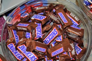 In 1930, Mars introduced Snickers, named after the favorite horse of the Mars family. The Snickers chocolate bar consists of nougat, peanuts, and caramel with a chocolate coating.