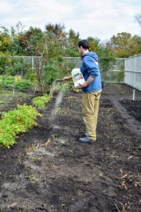 Before the the mulch is put down, Ryan sprinkles some plant food on all the beds. I love my new All-Purpose Plant Food from QVC. It's great for all types of plants: flowers, vegetables, trees, and shrubs.