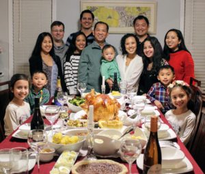 This family photo is from IP paralegal, Gianella Domdom. They enjoyed a traditional Thanksgiving dinner that also included Filipino dishes such as arroz caldo, a rice porridge, and karioka, a coconut dessert.