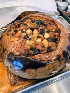 Every year, I make many vegetable dishes for my daughter, Alexis, and other vegetarians at my table, including this roasted pumpkin filled with fruit and nut stuffing, and roasted to perfection.