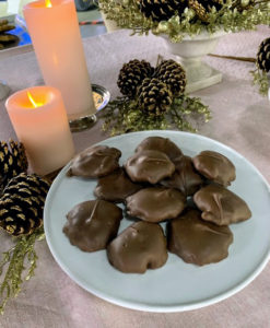 The Pecan Caramel Clusters are enrobed in chocolate and filled with caramel and pecans.