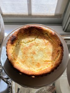 This is called a tarte au fromage. It resembles a ricotta cheesecake in flavor and texture, but it is made with a mixture of creme fraiche and farmer's cheese. I will teach you how to make it in the upcoming season 11 of my television show, "Martha Bakes" on PBS.
