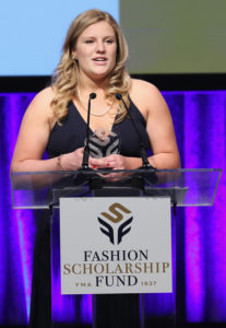Iowa State student, Jennifer Junker, was one of two scholarship award winners. Here she is on stage talking about her future goals and aspirations. (Photo by Cindy Ord/Getty Images for Fashion Scholarship Fund)