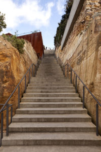 We walked up a giant stairway called Mona's 99 Stairs. The 99 stairs lead to and from the Boltanski Pavilion, and the Mona MR-1 Ferry jetty. (Photo by Rémi Chauvin, courtesy of Museum of Old and New Art)