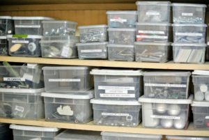 And across the room, we have a closet filled with plastic bins of bolts, screws, nails, clamps, etc. These bins may look very tidy, but over the months, they have become very disorganized, making things difficult to find when needed.