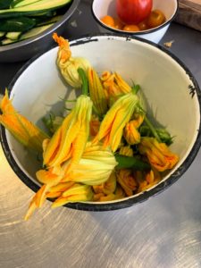 Everything that was cooked was picked fresh from the gardens that day - here is a bowl of colorful squash blossoms.