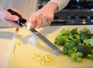 Among the first steps after cutting the broccoli into florets is to finely grate the Parmesan cheese. This is my "great grater", my Microplane Zester sold exclusively at Macy's - it's one of my favorite kitchen gadgets! https://mcys.co/2NtFpm3