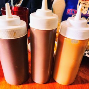 The restaurant has three barbecue sauces - ketchup-based spicy, spicy vinegar, and peach mustard. We tried them all and they were all delicious.