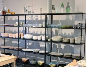 Inside this Warren Street store are new pieces - catering to the trend for irregular plates and bowls, tumblers and mugs, instead of cups and goblets with stems.