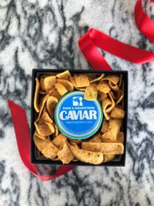 I received this from Kevin - caviar from Russ and Daughters placed in a gift box and surrounded with Fritos corn chips. www.russanddaughters.com