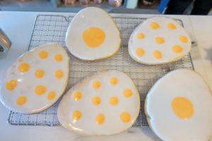 You'll also learn some design tips for decorating - the important thing is to avoid bubbles. On these cookies, I used bright white and bright yellow for polka dots and egg "yolks".