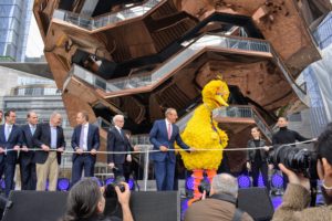 Big Bird asked the development team to join him and hold the ceremonial rope.