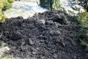 Mulch varies in composition but is most commonly made from organic material such as leaves, wood chips, grass clippings, peat moss, pine straw, or bark chips - I love the rich brown color.