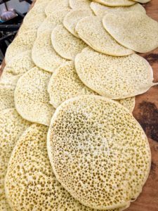 During a tour of the Shuk HaCarmel Market in Tel Aviv, Sarah and Thomas visited a Yemeni bakery where they were making breads.