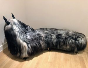 And this is called Rita Chaise-worth (2017) - made from gray Icelandic sheepskin, cast bronze and carved ebony. It is 90-inches in length.