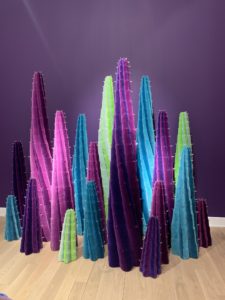And this installation is called Cacti (2018). The Haas Brothers used velvet, brass and poly-fiber fill to make these 19 "cactus" plants all in various heights.