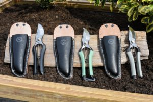 These are my tried and true Martha Stewart Easy Grip Secateurs with Protective Sheath. They are so easy to use for all those pruning tasks. It has a durable chrome-plated blade and includes a handy holster for carrying around the yard.