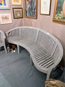 The Village Braider paired the chair with this curved bench.