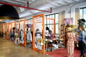 An installation called “Small Business Marketplace,” allowed five local, female-led businesses to showcase their brands. They included jewelry line Bliss Lau, floral decor brand East Olivia Creative, logo clothing shop YES I AM, sunglasses store Coco and Breezy and hat designer Teresa Foglia. (Photo by Ilya Savenok for Getty)